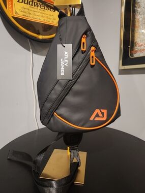 Atley James Black Sling Bag with Orange Trim